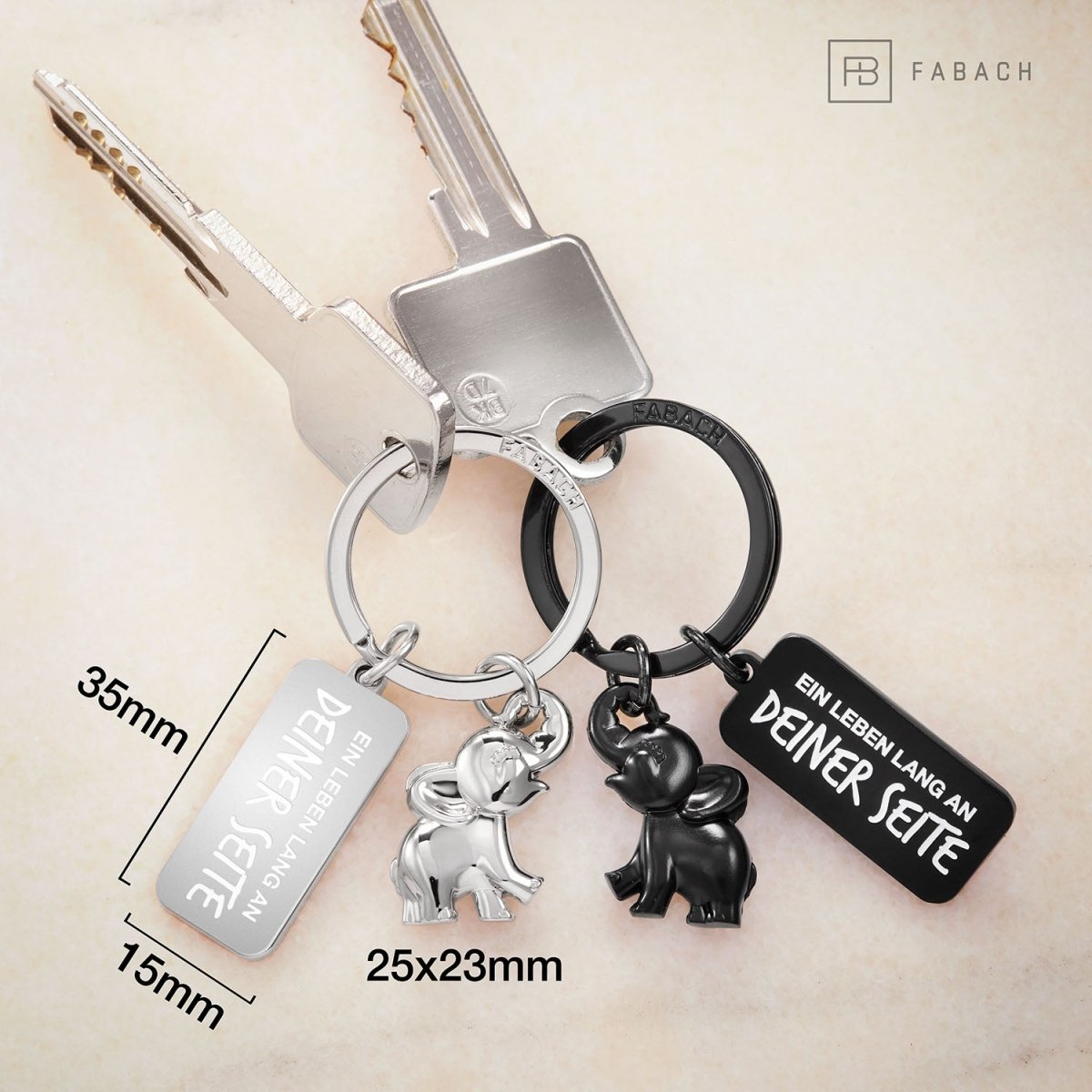 "Jumbo" Elefant Schlüsselanhänger - romantisches Partnergeschenk - zwei Schlüsselanhänger für Paare Freundinnen Schwestern - FABACH#farbe_Schwarz & Silber