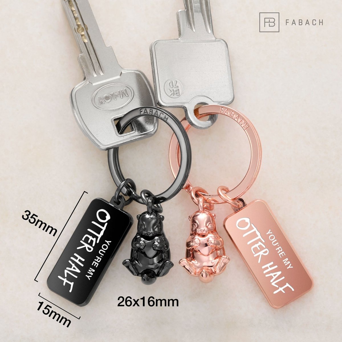 "Otty" Otter Schlüsselanhänger - romantisches Partnergeschenk - zwei Schlüsselanhänger für Paare Freundinnen Schwestern - FABACH#farbe_Schwarz & Roségold