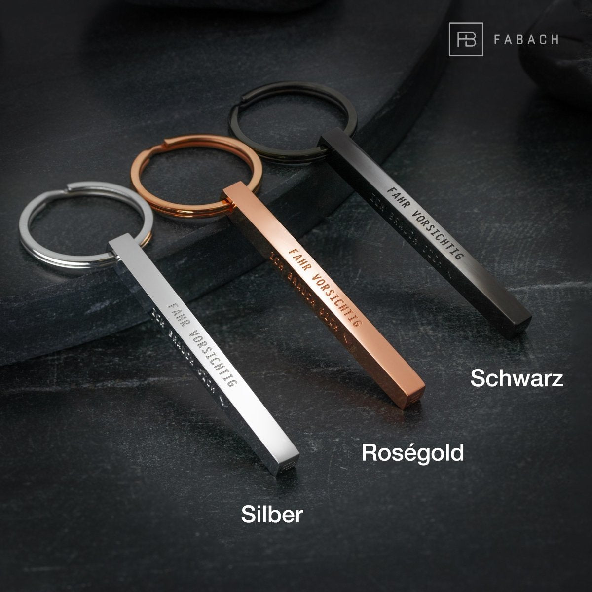 "Cuboid" Quader Schlüsselanhänger aus Edelstahl - Stäbchen Anhänger mit Gravur "Fahr vorsichtig" - FABACH