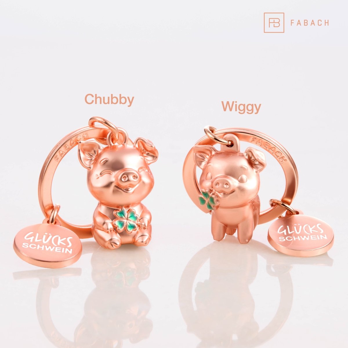 Glücksschwein Schlüsselanhänger "Wiggy" mit Kleeblatt - Glücksbringer Geschenk - Viel Erfolg Glücksbringer - Viel Glück Schweinchen - FABACH – Die Schlüsselanhänger - Schmiede