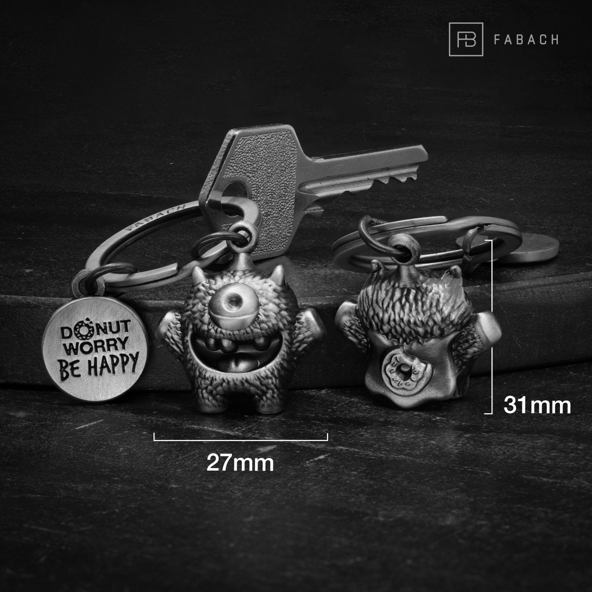 "Cyklops" Schlüsselanhänger Mutmacher - Süßes Glücksmonster mit Gravur "Donut worry, be happy!" - Kummermampfer Glücksbringer - FABACH#farbe_antique silber
